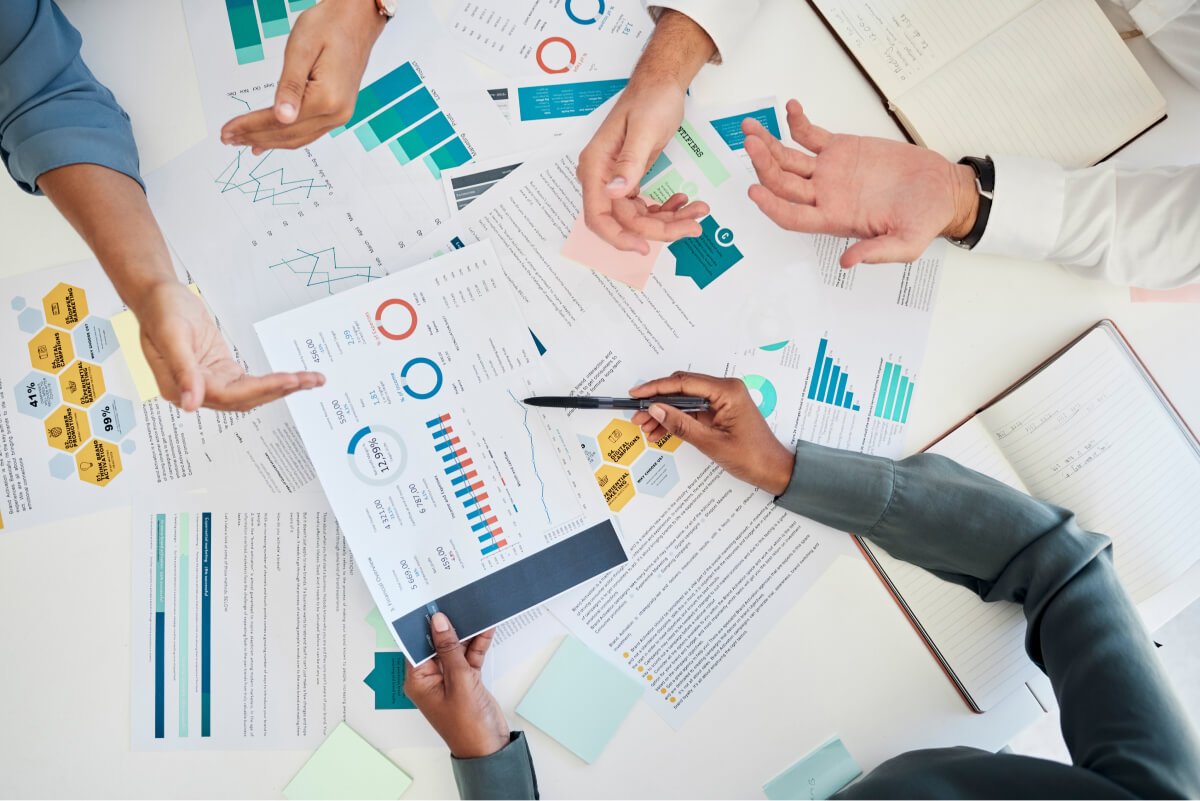 digital-marketing-hands-and-data-analysis-meeting-2022-12-22-19-29-54-utc.jpg